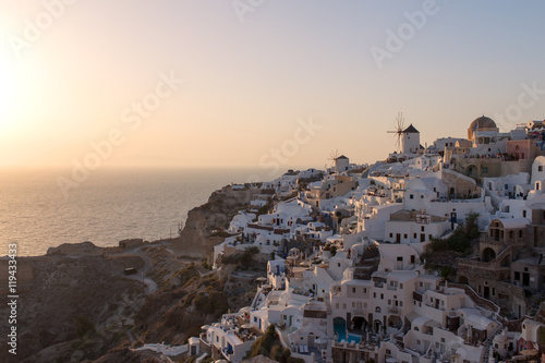 Santorini Island - view of the famous windmills at sunset