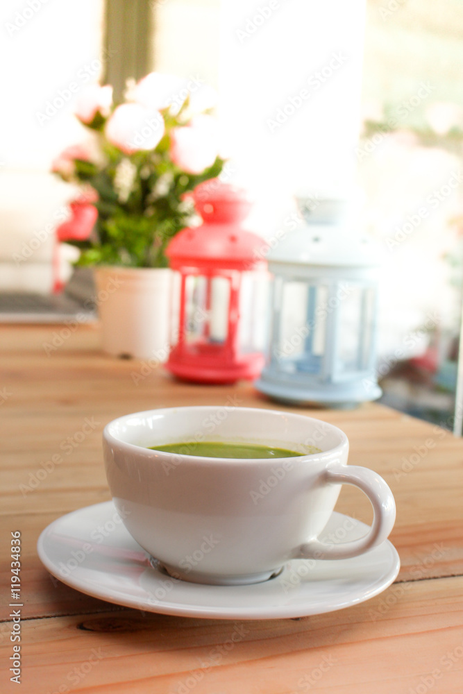 green tea on wooden in tea & coffee shop green tea on wooden in tea & coffee shop