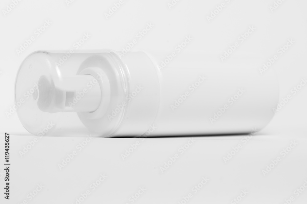 Plastic bottle of skin care product on white background
Plastic bottle of skin care product on white background