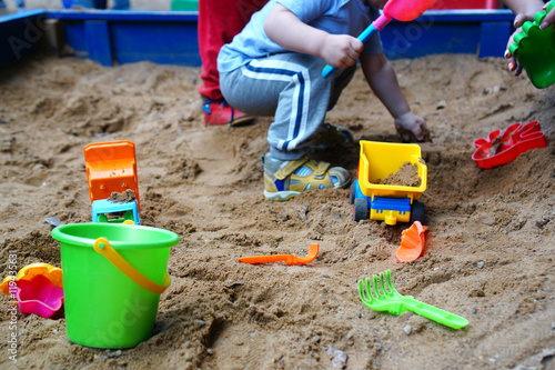 children's toys in the sandbox