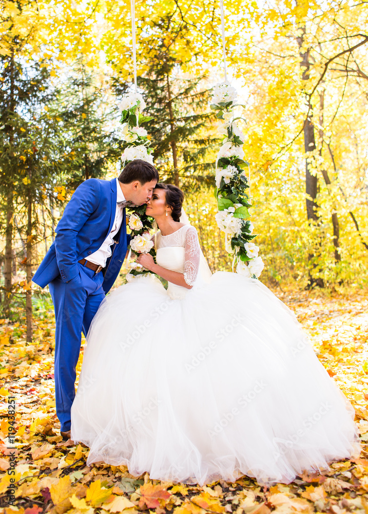 Bride and Groom in autumn nature Bride and Groom in autumn nature