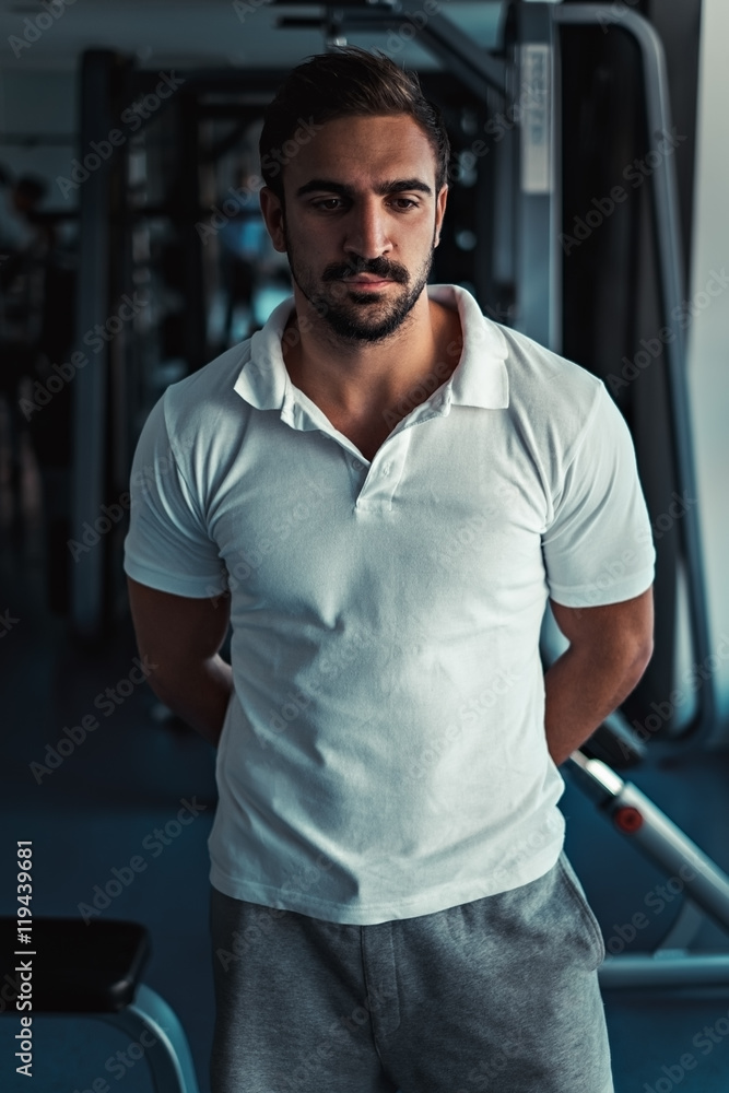 Trainer thinking in the gym Trainer thinking in the gym