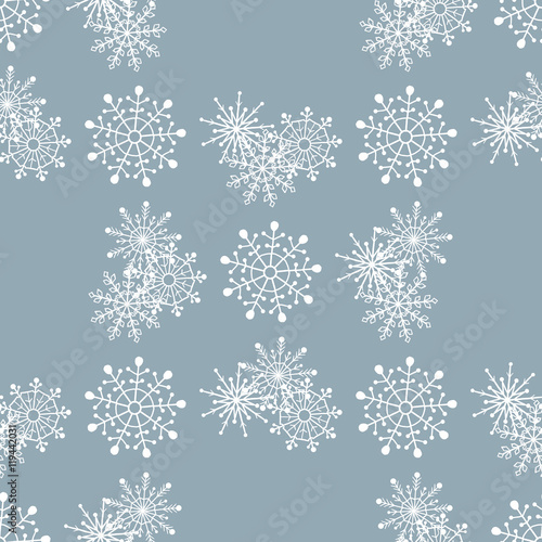 Seamless pattern of snowflakes. Vector illustration