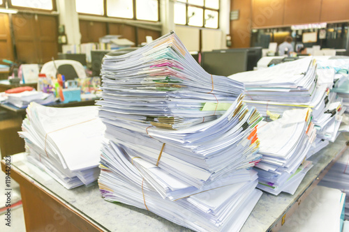 Photography Pile of documents on desk at workplace