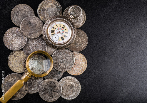 Ancient  money pocket watch background.Concept  antiques
