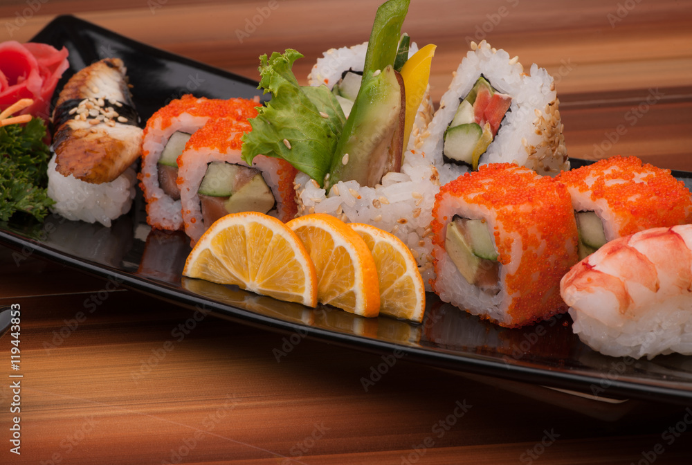 assortment of sushi in black square plate