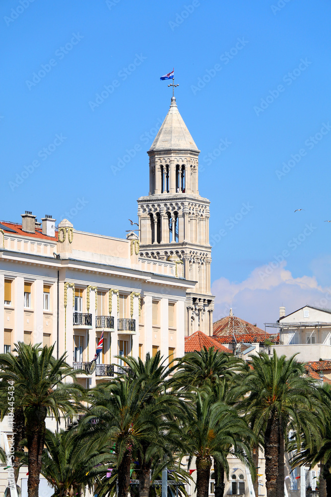 Historical Saint Domnius bell tower and architecture on Riva Promenade - landmarks in Split, Croatia. Split is popular touristic destination and UNESCO World Heritage Site. Historical Saint Domnius bell tower and architecture on Riva Promenade - landmarks in Split, Croatia. Split is popular touristic destination and UNESCO World Heritage Site.