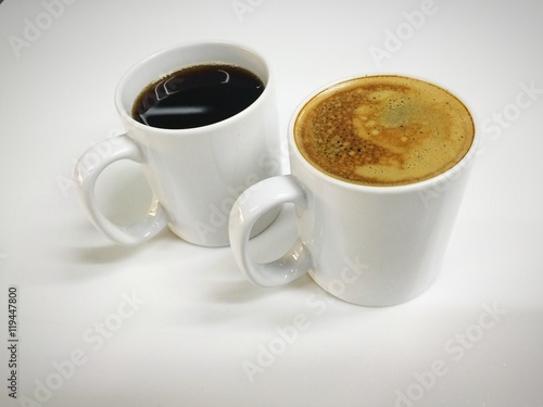 Cappuccino and black coffee in mug white black ground