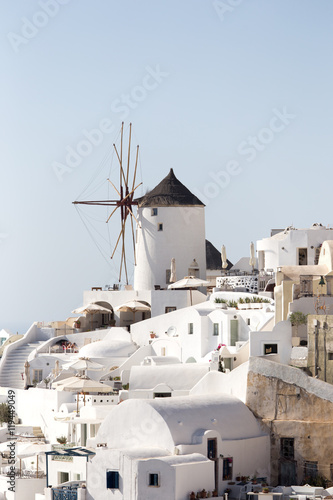 Windmill of Oia town at sunny day, Santorini