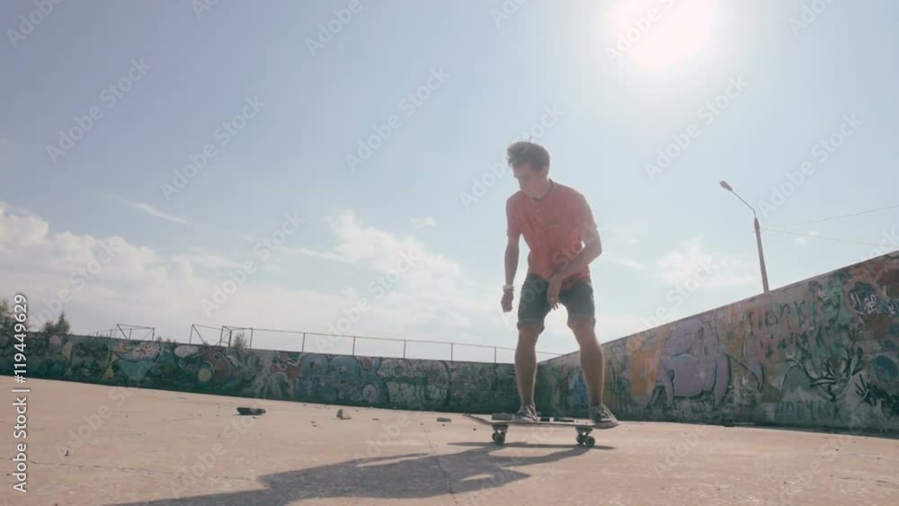 Skateboarder doing tricks in a city. HD. Skateboarder doing tricks in a city. HD.