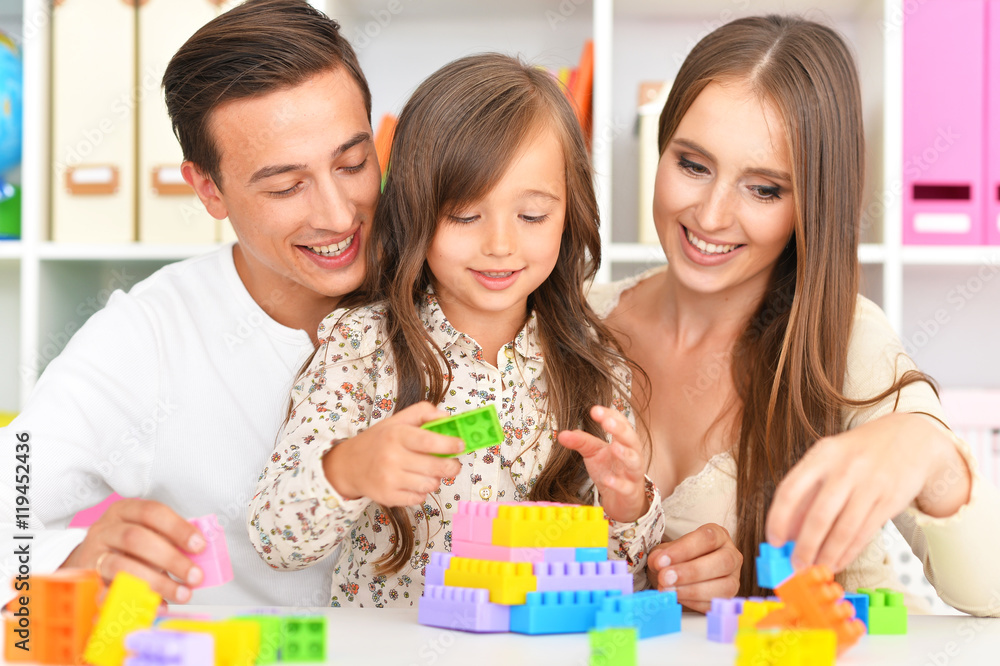 Happy family playing at home Happy family playing at home