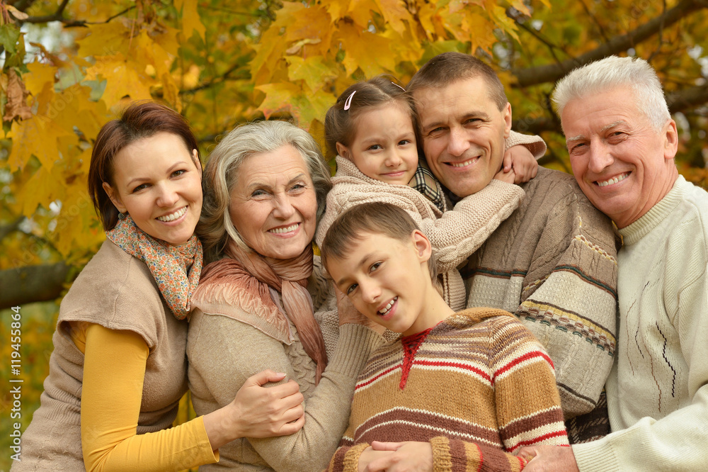 Family relaxing in autumn park Family relaxing in autumn park
