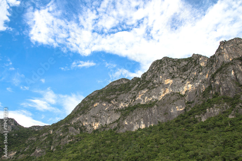 Beautiful calcite mountain with blue sky at khao sam roi yod nat