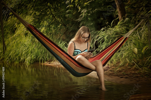 girl in a hammock with a phone in his hand