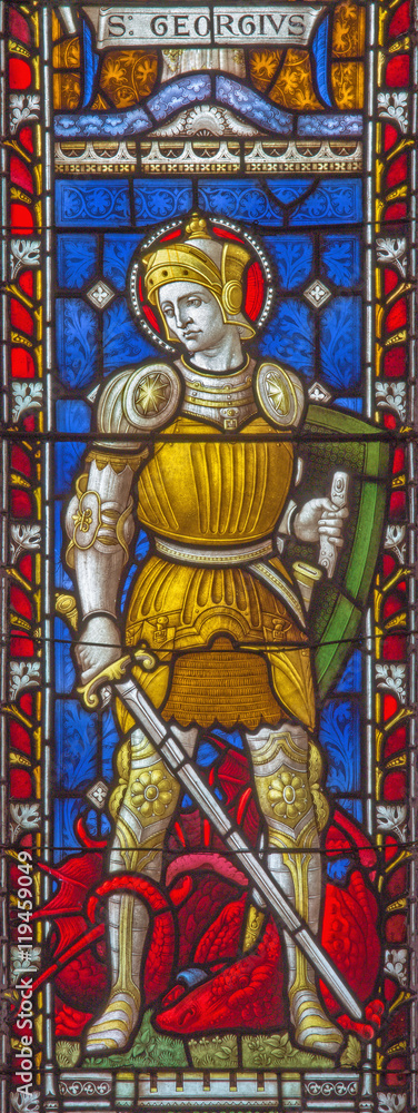 ROME, ITALY - MARCH 9. 2016: The St. George on the stained glass of All Saints' Anglican Church by workroom Clayton and Hall (19. cent.)