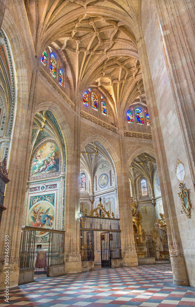 SEGOVIA, SPAIN, APRIL - 14, 2016: The gothic vault and side chapels in Cathedral of Our Lady of Assumption with the neoclassicistic frescoes.