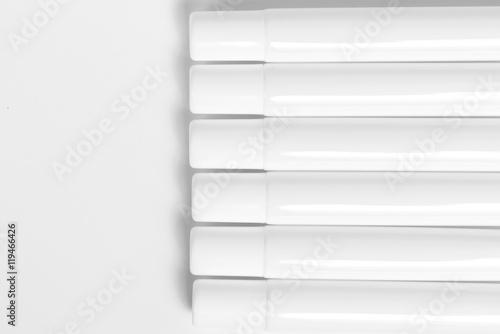 still life portrait of a group of product packaging. isolated over white