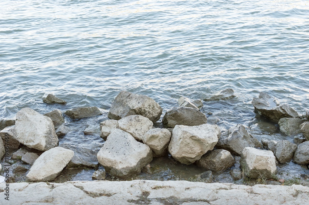 River shore with rocks afternoon