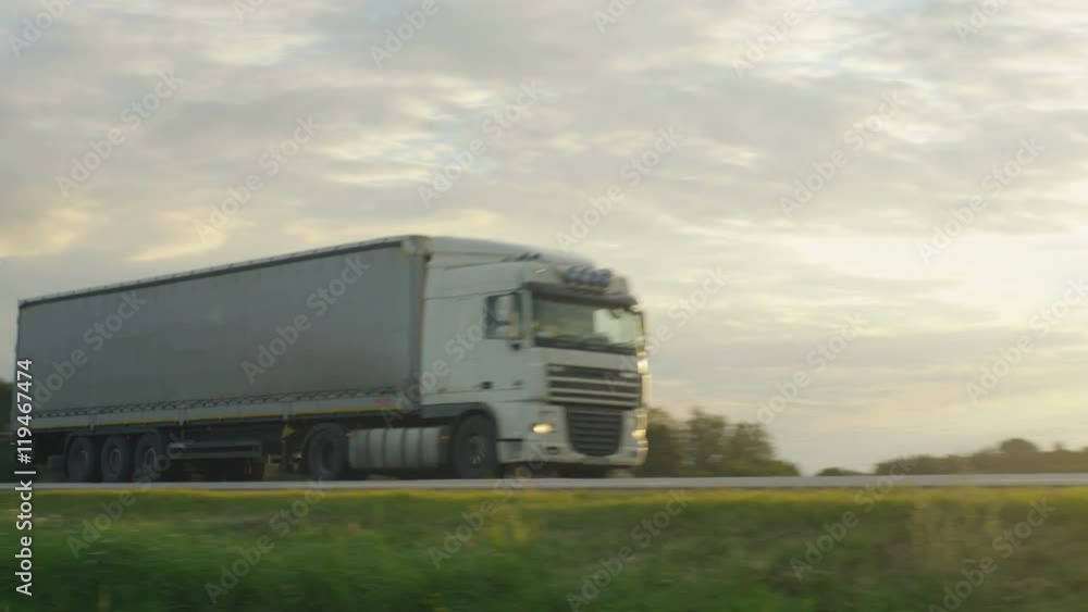 Trucks Driving on Highway.