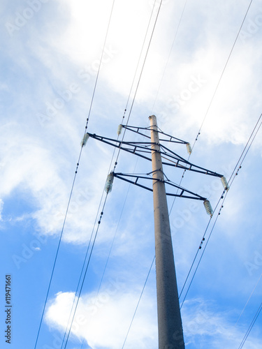 Power line on background of blue sky