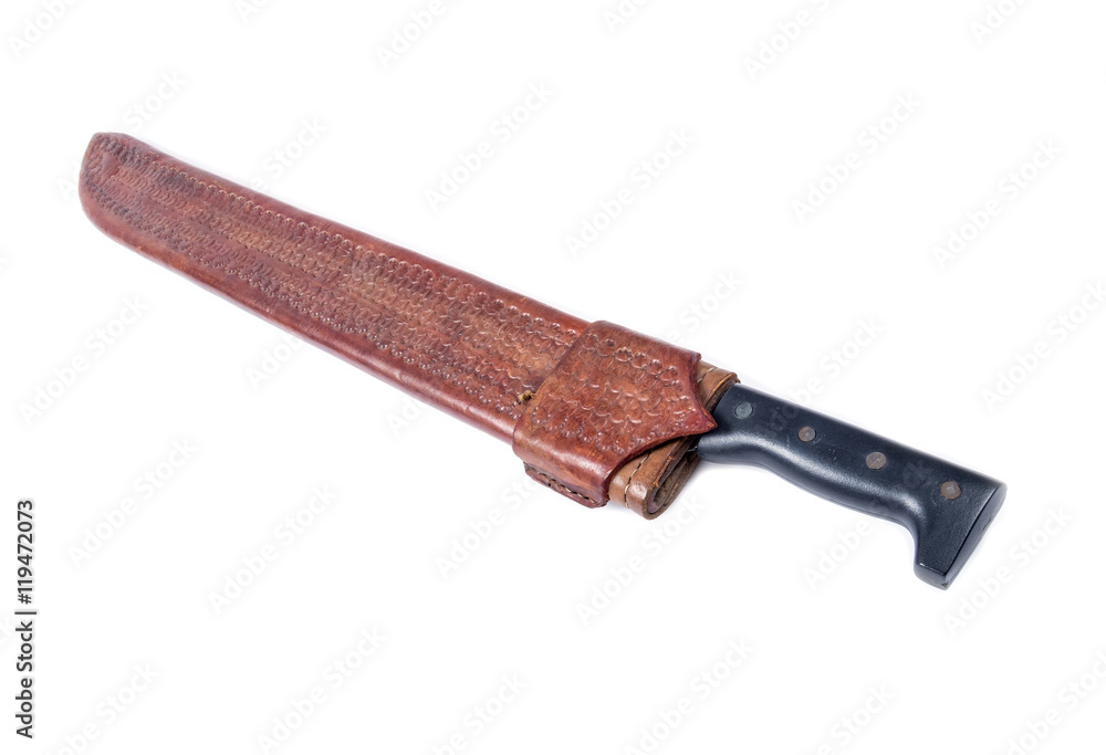 Old Machete Knife in an Ornate Brown Leather Case Isolated on White. Old Machete Knife in an Ornate Brown Leather Case Isolated on White.