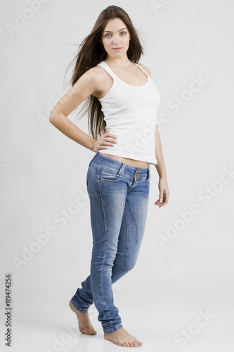 stylish young woman posing in clear background