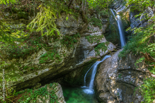 The canyon Mostnica (Korita Mostnice) with crystal clear water and Mostnica waterfall in Triglav national park, Slovenia