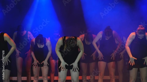 dance group performs on stage