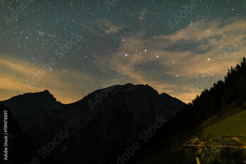 Starry night sky over the mountains of Tyrol Austria