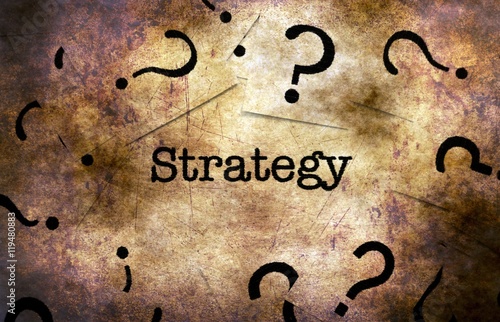 Strategy and question marks grunge concept