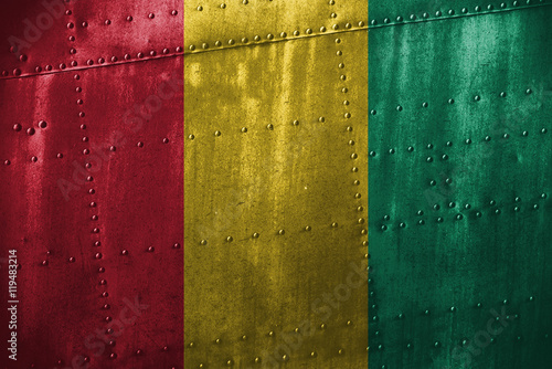 metal texutre or background with Guinea flag