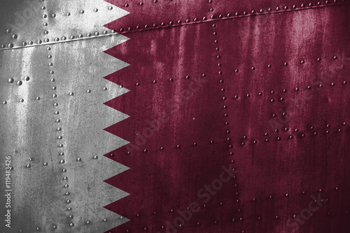 metal texutre or background with Qatar flag