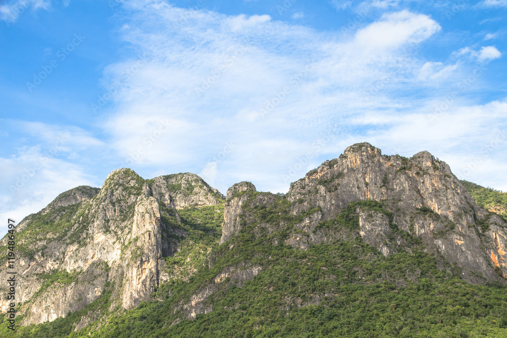 Beautiful calcite mountain with blue sky at khao sam roi yod nat