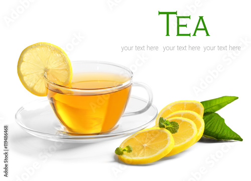 Glass cup of tea with lemon slices on white background. Space for text.