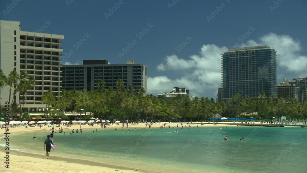 Waikiki Beach with Tourists in Water relaxing Waikiki Beach with Tourists in Water relaxing