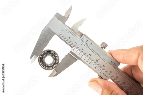 Measuring bearing by vernier caliper photo