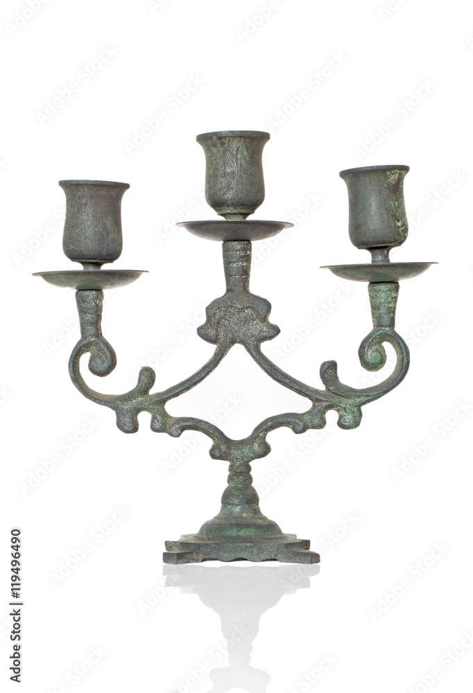 antique green candlestick on white