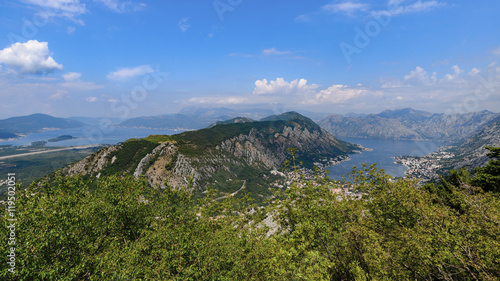 Panorama of the Kotor Bay from a mountain on a sunny day with a