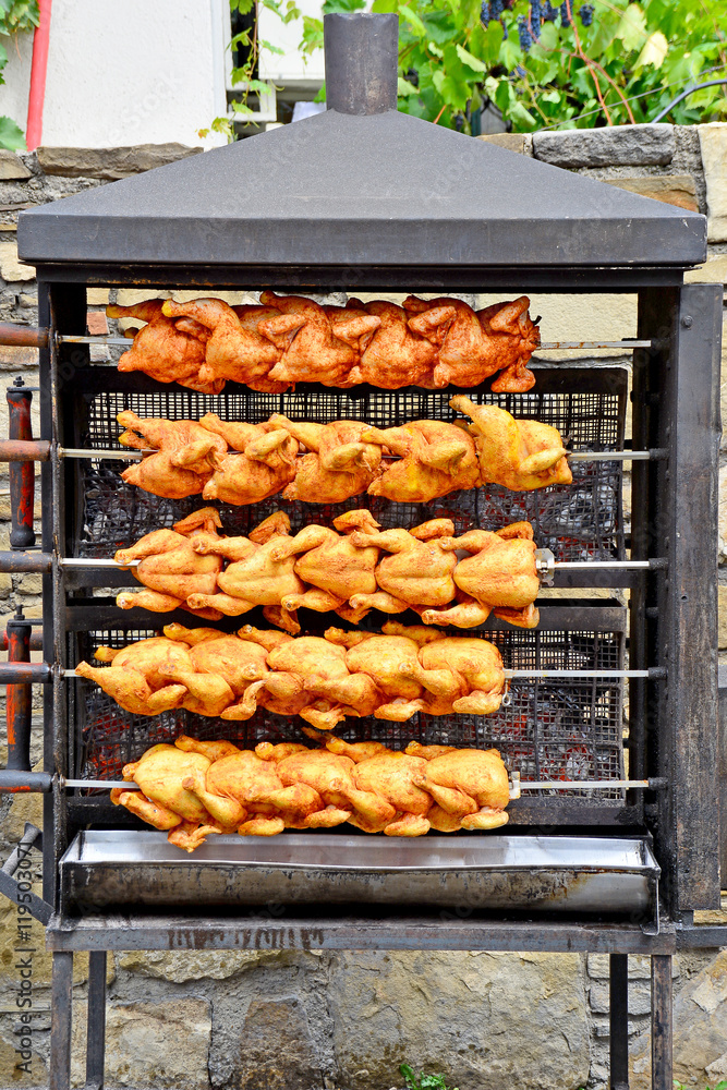 Brathähnchen am Vertikalgrill Brathähnchen am Vertikalgrill