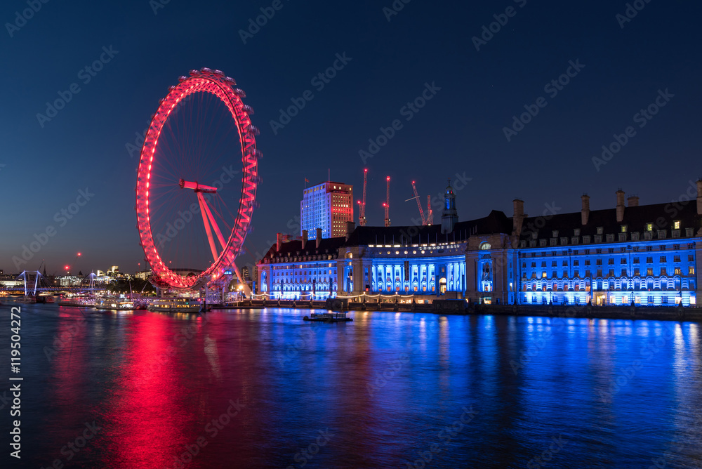 Evening at the London Eye and the River Thames in London, UK