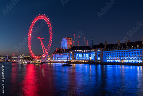Fototapeta Evening at the London Eye and the River Thames in London, UK