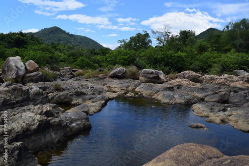 fresh Ham Ho stream with rock reflect on water surface in Binh Dinh, vietnam