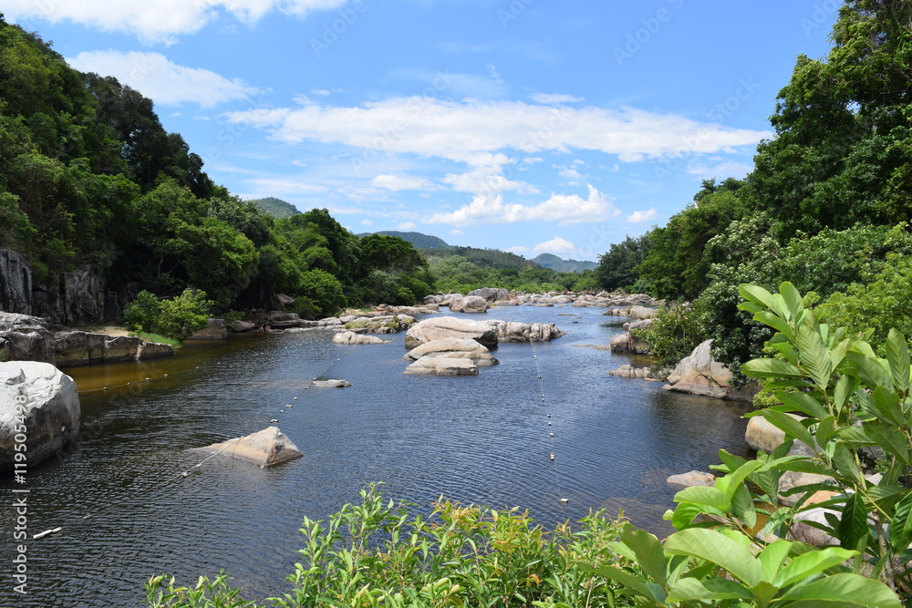 fresh Ham Ho stream with rock reflect on water surface in Binh Dinh province, vietnam