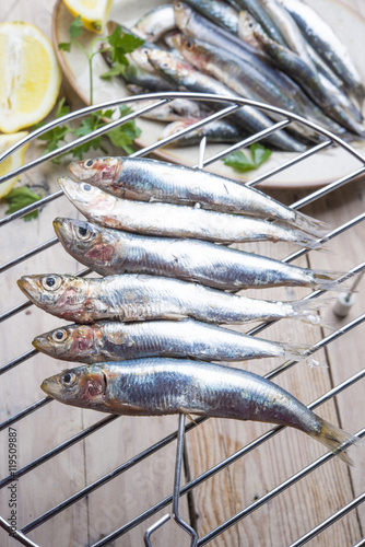 Typical Portuguese grilled sardines cooked in hot coals