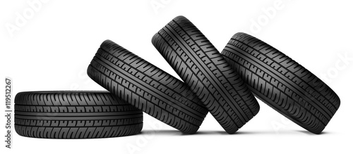 Pile of four black wheel tyres for car