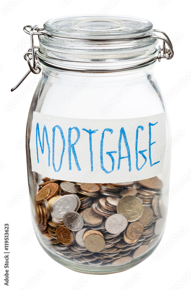 saved coins for mortgage in closed glass jar saved coins for mortgage in closed glass jar