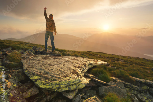 Winner silhouette on the mountain top. Sport and active life concept.. © biletskiyevgeniy.com