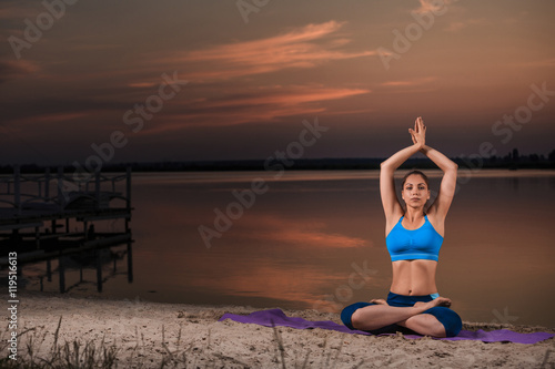 yoga at sunset on the beach.