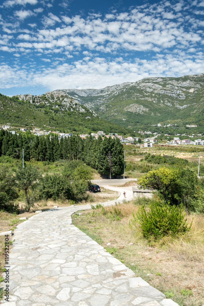 Old rocky road from hill down