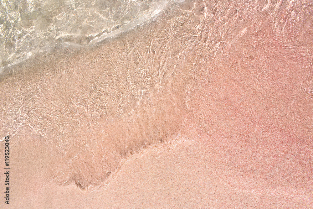 background of pink sand on the beach